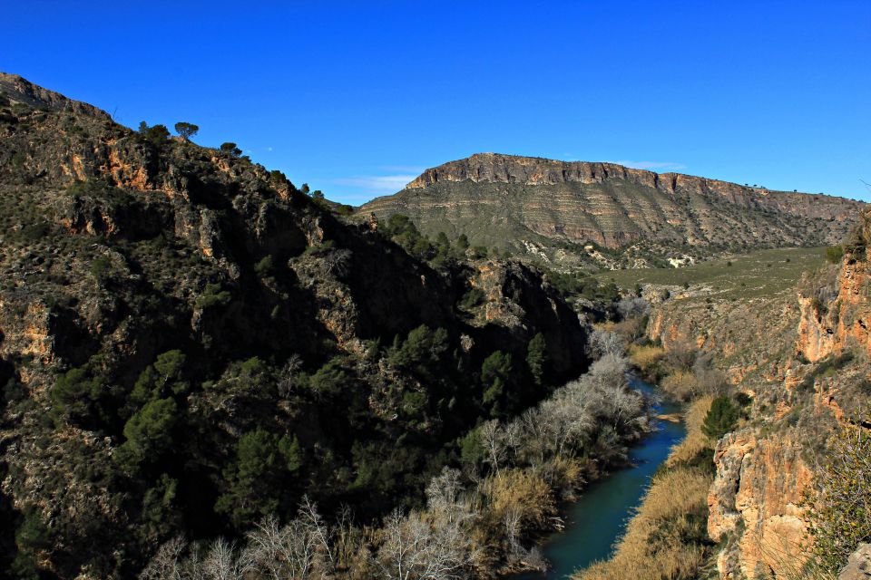 Calasparra: Almadenes Canyon Rafting with Caves and Rock Art - Stop on the banks: Monigotes Cave rock art and the workshop-style visit (30 minutes)