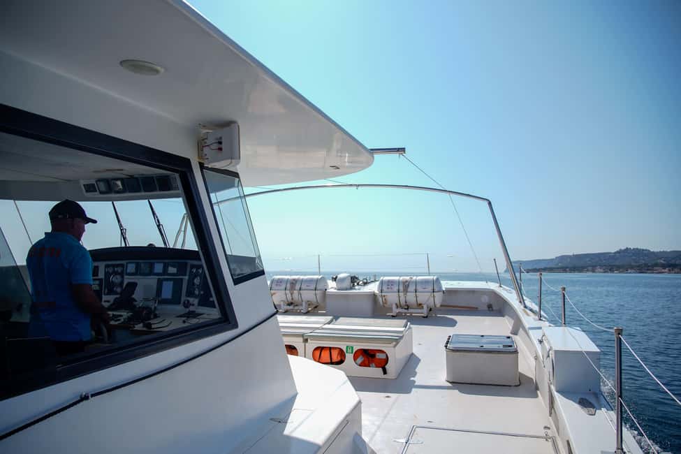 Calpe: Motor catamaran with a swim stop and optional lunch - Lunch onboard: Valencian paella, salad, and one drink