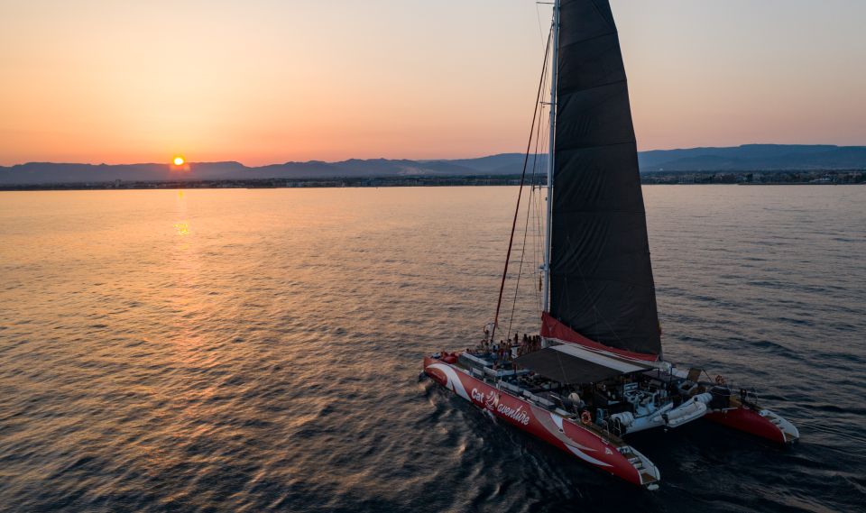 Cambrils: Sunset Catamaran Cruise & Drinks w/ Sunbed - The Montroig Water Stop: Swimming, Snorkeling, and Seabeds