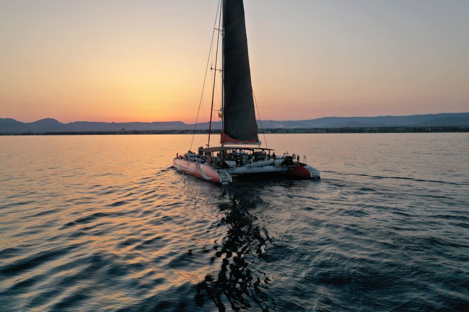 Cambrils: Sunset Catamaran Cruise & Drinks w/ Sunbed - The 150-Minute Flow: Sail, Drinks, Then Anchoring