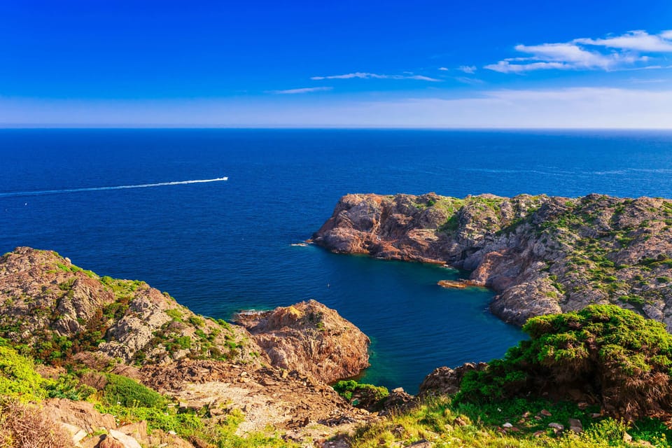 Cap Norfeu: Costa Brava Catamaran Trip with Underwater Views - Landmarks You Pass: Roses, Lighthouse, and the Castle of La Trinitat
