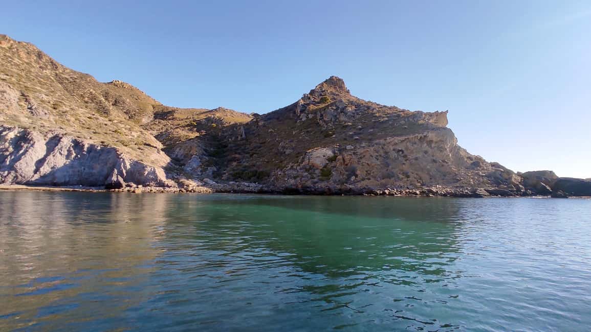 Cartagena: Guided boat tour to Isla de las Palomas - Military Arsenal and Navantia Shipyards: the port as a living machine