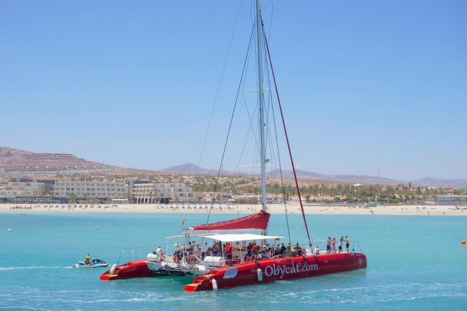 Catamaran Half-Day Cruise from Caleta de Fuste - On-board vibe: music, open bar, and where to sit
