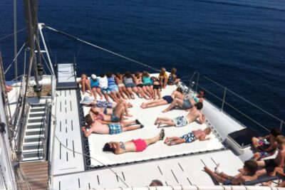 Catamaran ride -Costa Brava with barbecue and drinks. Familiar. - Sailing the Costa Brava northbound toward Tossa