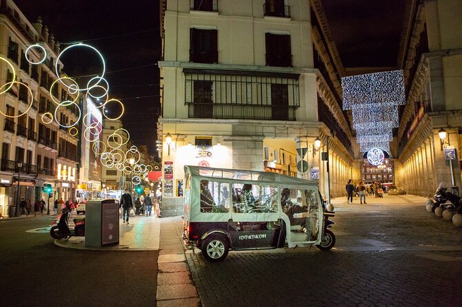 Christmas Lights Tour of Madrid in Eco Tuk Tuk Private - Palacio de Cibeles and the surrounding palace power zone