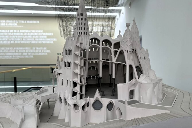 Colonia Guell & Gaudi's Crypt Admission Ticket with Audioguide - Inside Gaudí’s Crypt: Arches, Spirals, and Two Naves