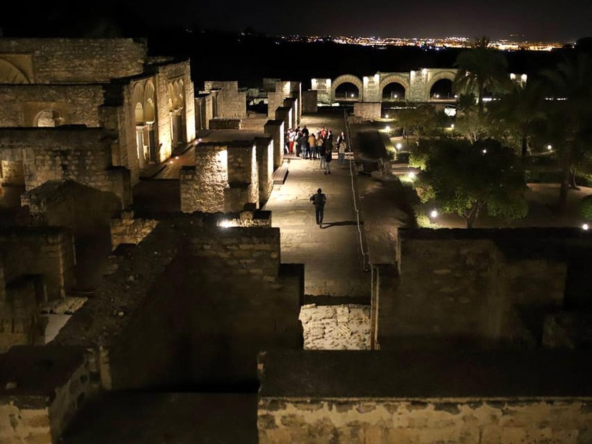 Cordoba: Guided Tour of Medina Azahara at Night - Getting There from Córdoba: Bus Transfer vs. 8 km Walk