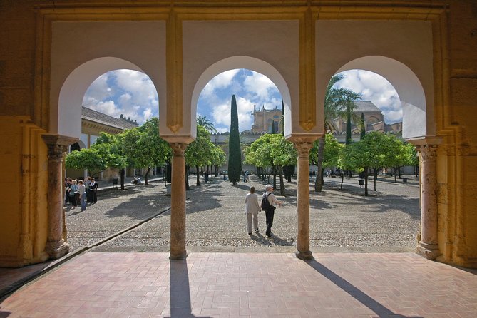 Cordoba Mosque & Jewish Quarter Guided Tour with tickets - Inside the Mezquita-Catedral: Horseshoe Arches, the Mihrab, and Christian Additions