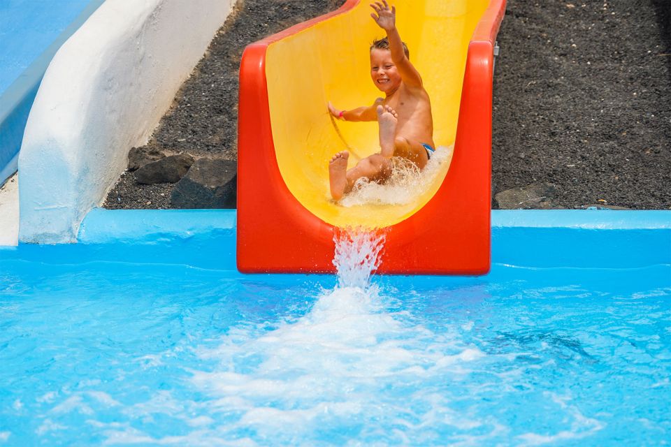 Corralejo: Acua Water Park Entry Ticket - Slides, ring rides, and the wave pool that sets the vibe