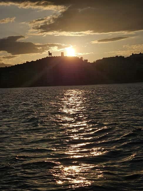 Costa del Sol: Best Sunset Cruise from Fuengirola - Catamaran comfort: two floors, crew, toilets, and bar service