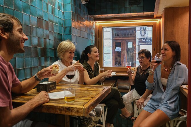 Eating San Sebastian: Beyond Pintxos Tour - Building a pintxo in a Gros wine-and-beer shop: Gilda making and Mosto Spritz
