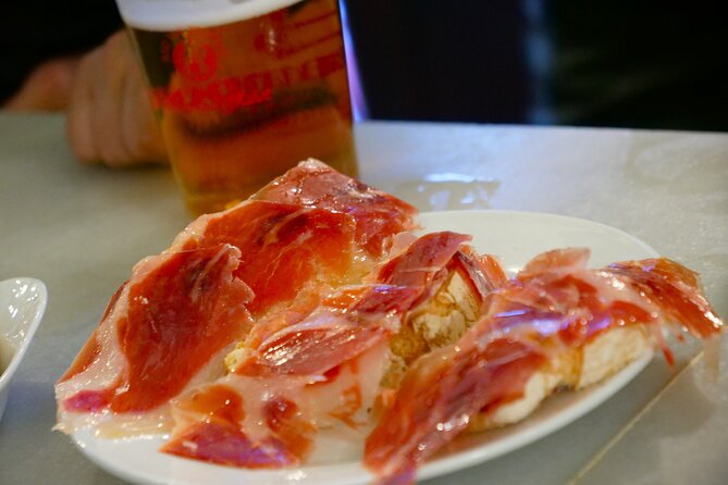 Eating Seville: Tapas, Drinks and Local Flavors Tour - Bodega La Aurora: Flambé Chorizo al Infierno and Tinto de Verano Skills