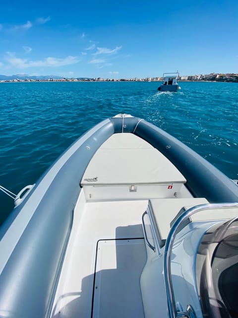 El Arenal: Private Mallorca Boat Rental (No License Needed) - The boat setup: sun shade, ladder, anchor, and Bluetooth