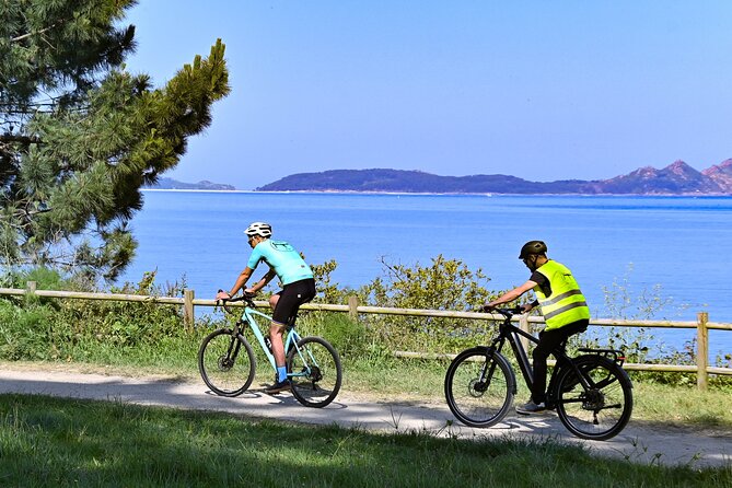 Electric bike tour with optional pick-up for cruisers - Casco Vello and the Olive Tree viewpoint: history, sea views, and a real workshop