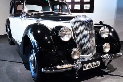 Entrance to the Motor Museum - Inside the main halls: classic and film cars you can follow