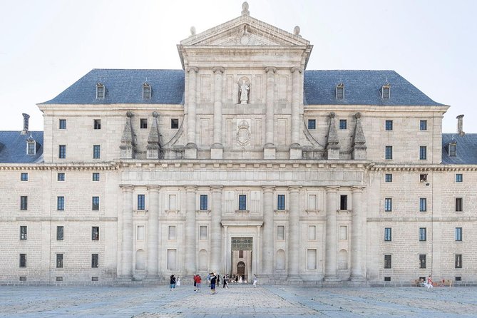 Escorial Monastery and the Valley of the Fallen from Madrid - Real Sitio de San Lorenzo de El Escorial: royal tombs, basilica areas, and that Baroque dome