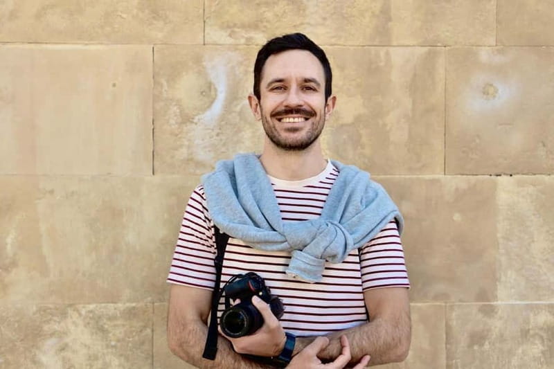Explore Madrid by bike taking photos with Benja - Plaza Mayor and Almudena Cathedral: two very different moods