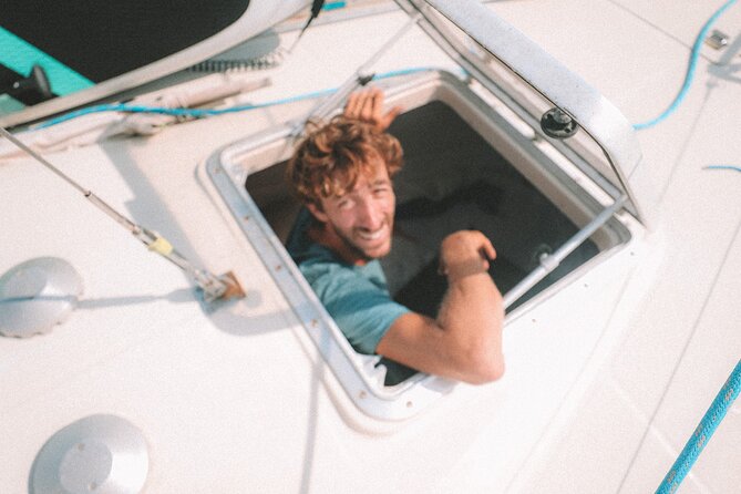 Formentera & Espalmador: Full-Day Private Sailboat Trip - Cala Saona: rocky caves, reddish tones, and paddling practice