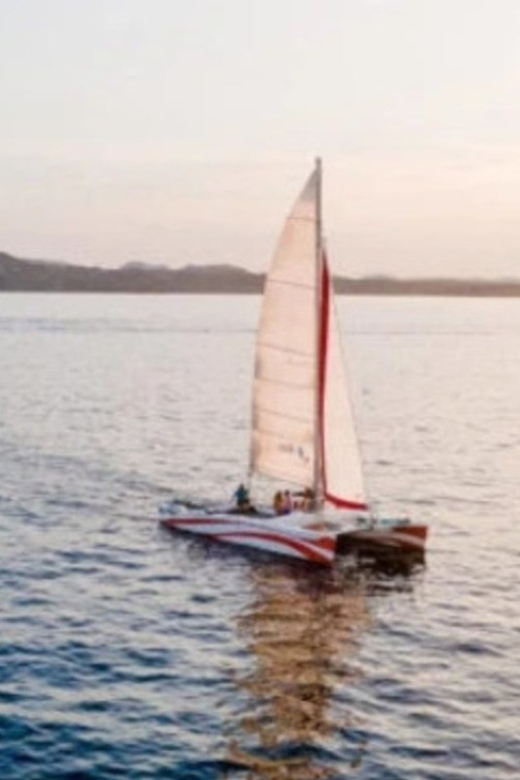 Fornells: Catamaran Sunset Cruise of Menorca's Coast - Menorca’s golden hour from the water (not the shore)