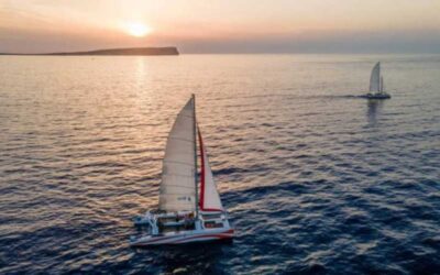 Fornells: Catamaran Sunset Cruise of Menorca's Coast - From shop check-in to catamaran: where you start matters