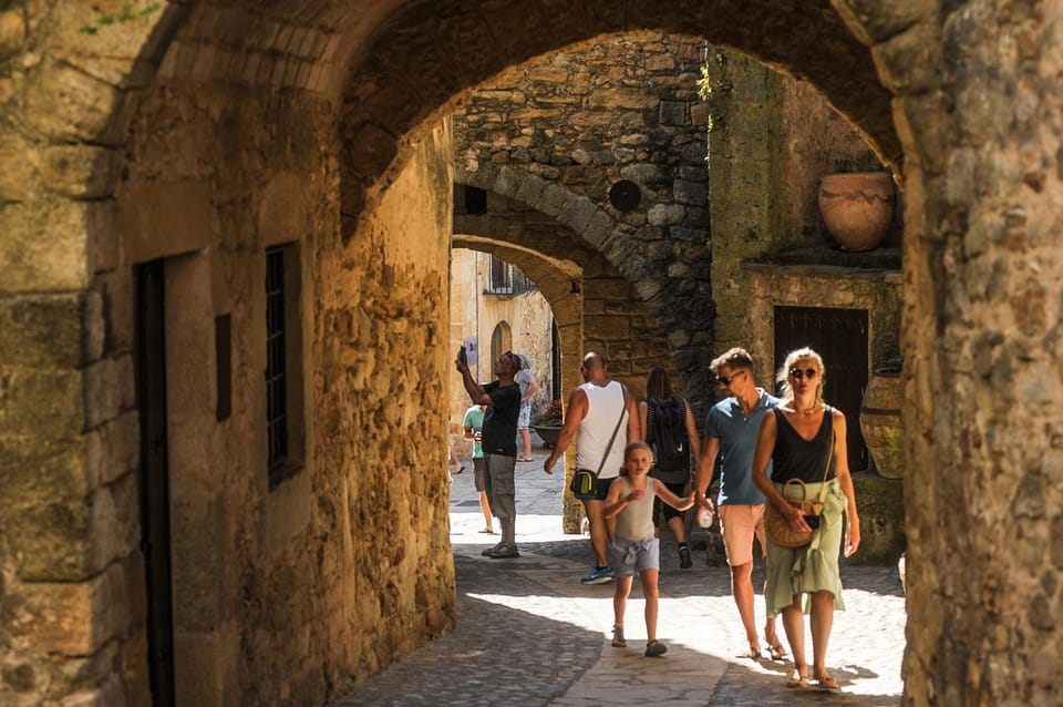 From Barcelona: Girona and Costa Brava Day Tour - Calella de Palafrugell: whitewashed houses and your built-in swim stop