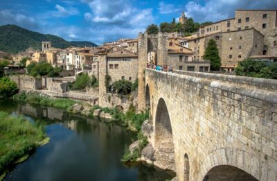 From Barcelona: Medieval Villages Day Tour - Besalú medieval walk: arcades, the mikveh, and a Jewish past