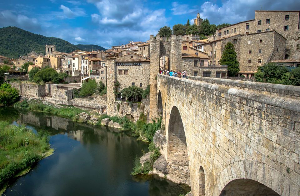 From Barcelona: Medieval Villages Day Tour - Besalú medieval walk: arcades, the mikveh, and a Jewish past