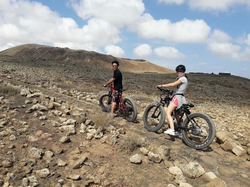 From Corralejo: Fuerteventura Guided E-Bike/E-scooter Tour - Returning to Corralejo with a Popcorn Beach stop
