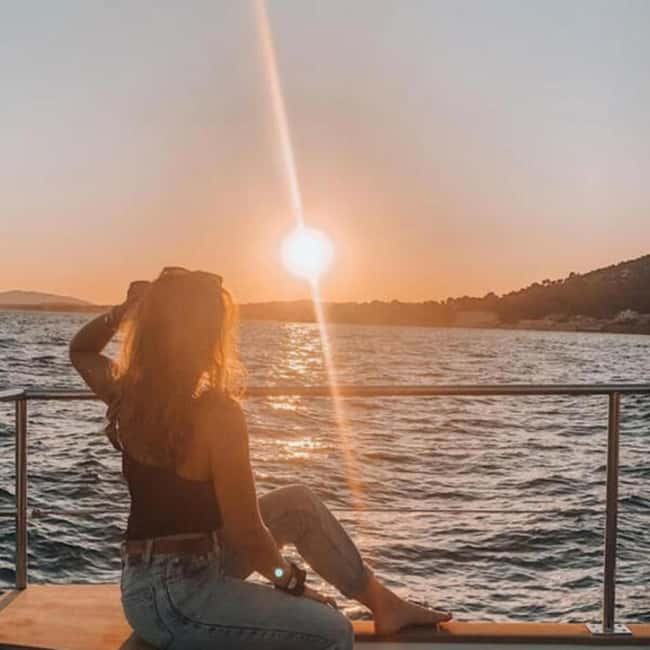 From Denia: Sunset Catamaran Trip - Leaving port: the cliffs of Dénia before the sun even drops