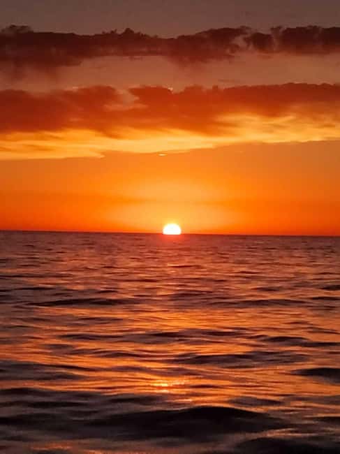 From Denia: Sunset Catamaran Trip - On board with a cava toast and soft music