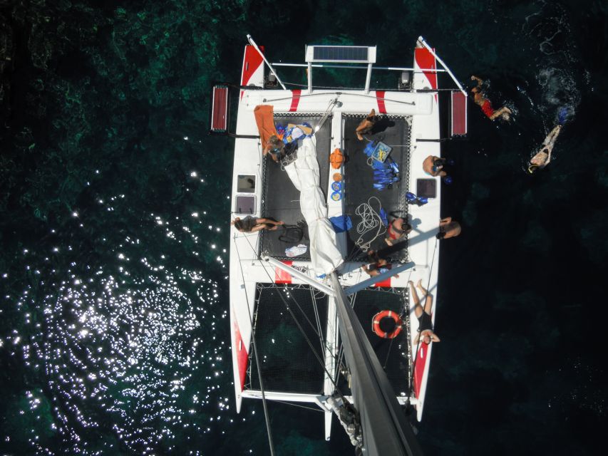 From Fornells: Half-Day Menorca Catamaran Trip w/ Snorkeling - Comfort and Service Reality Check: Old Boat Notes, Mixed Front-Desk Feel