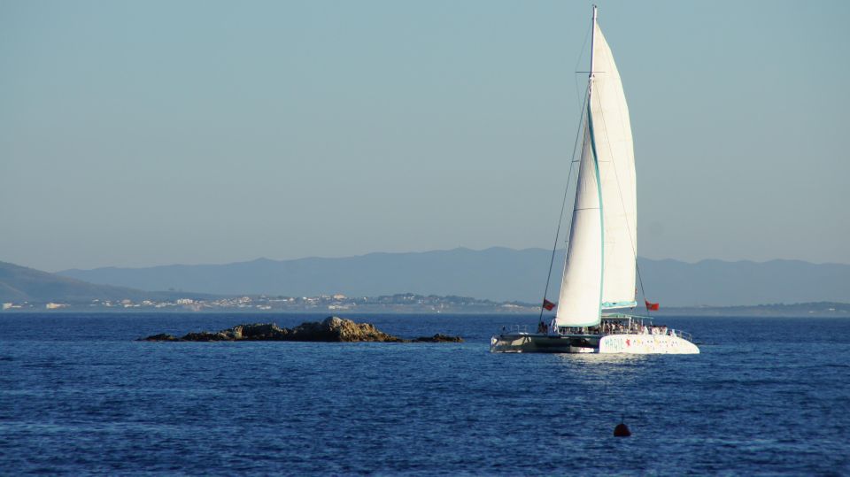 From Roses: Sunset Catamaran Cruise - What the sunset route includes when skies cooperate