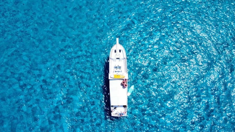 From San Antonio: Family Boat Tour to Conillera Island - The coastal cruise: Cala Bassa, Cala Comte, and Port des Torrent vibes