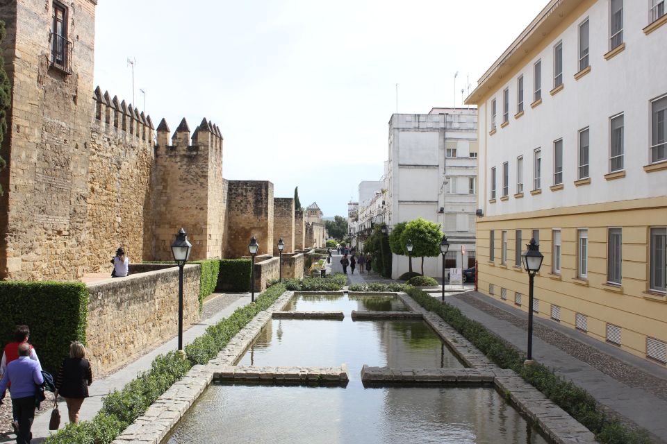 From Seville: Cordoba and Mosque Cathedral Guided Tour - Walking the Judería: streets, symbolism, and a real synagogue stop