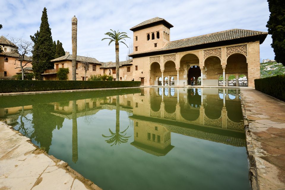 From Seville: Granada & Alhambra Tour with Optional Ticket - Entering the Alhambra: Guided Stops at Generalife and Nasrid Palaces