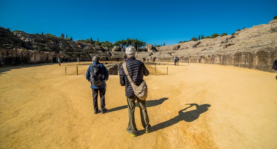 From Seville: Italica Roman City Tour - Mosaics, Traianeum, Statues, and Baths: Why These Details Matter