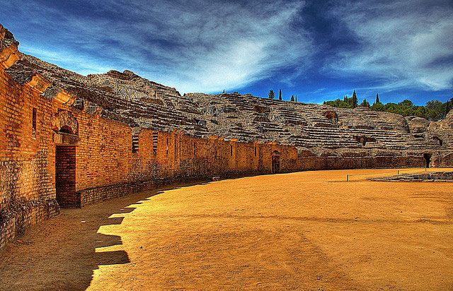 From Seville: Italica Roman City Tour - The Partially Reconstructed Roman Theater in Santiponce
