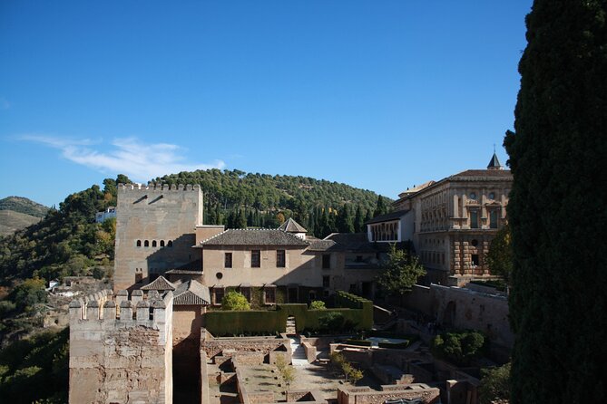 Full-Day Alhambra from Malaga: Choose Your Access & Pick Up Point - Palace of Charles V: the contrast that makes your brain go wow