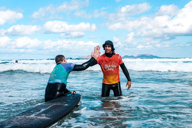 Full Day Surf Lesson for Beginners in Famara, Spain - The beach-first method: warm-up, exercises, and stand-up basics