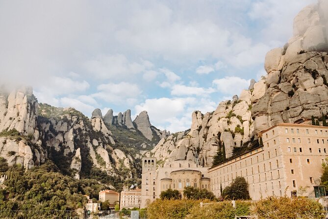 Full-Day Trip Barcelona to Montserrat Monastery & Cava Winery - Montserrat basilica and monastery: La Moreneta in context