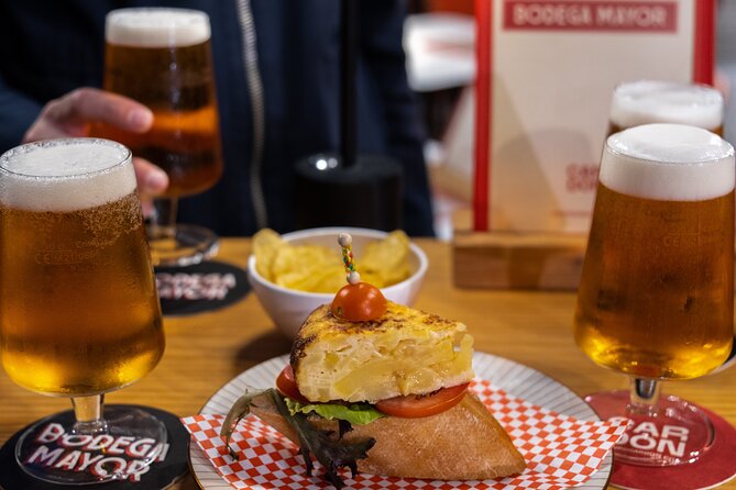 Gourmet Tapas and Wine Tour in Palma de Mallorca - Plaça Major: your built-in pause for photos and snacks