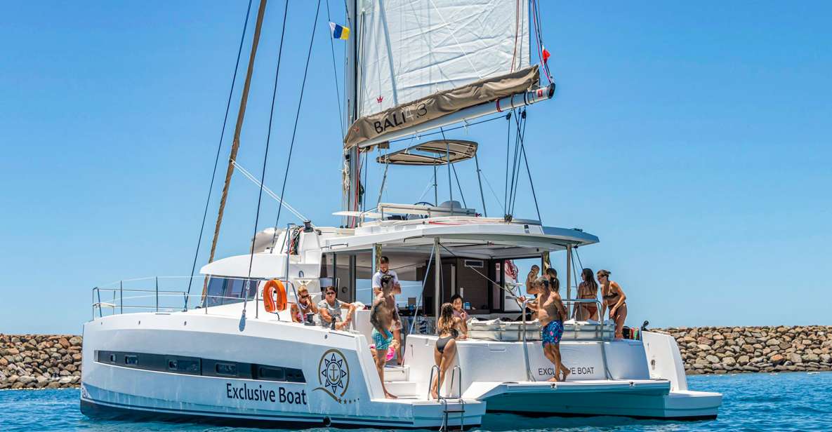 Gran Canaria: Catamaran Day Trip with Food and Drinks - Catamaran cruising from Puerto Rico de Gran Canaria: your 4.5-hour slice of the south