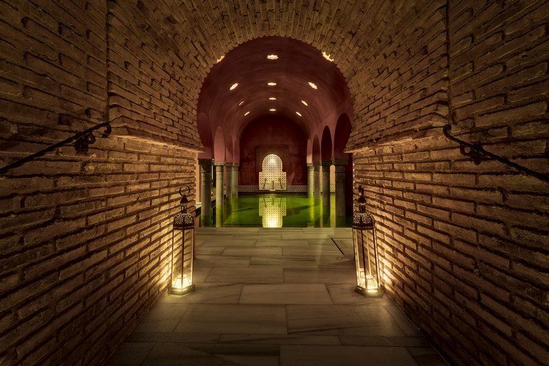 Granada: Alhambra Guided Tour and Arabian Bath and Massage - Charles V and the Alcazaba Fortress: power, views, and context