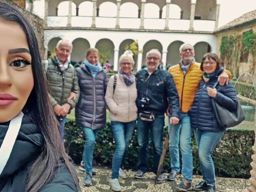 Granada: Full Alhambra Premium Guided Tour with Tickets - Meeting at Ticket De Alhambra: How to Find Your Blue Umbrella Fast