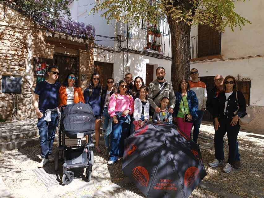 Granada: Historic Center and Lower Albaicin Walking Tour - Historic Center highlights: Corral del Carbón, Alcaicería, and Plaza Bib Rambla