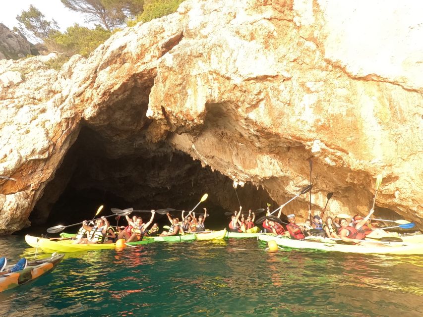 Granadella: Caló, Cova Llop Marí, and Ambolo Kayak Trip - Kayaking from Platja Granadella: your first 20 minutes set the tone