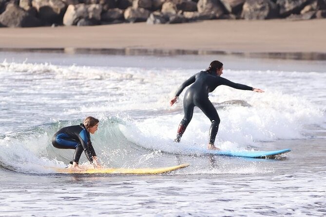 Group Surf Class in Playa de Las Américas with Photographs - The “after surf” routine: stretching, snacks, shower, and gear care