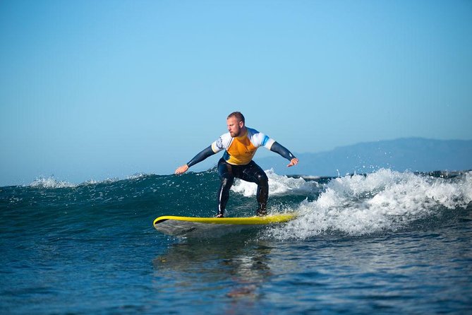 Group Surf Lessons - From warm-ups to standing up: how beginners get set up