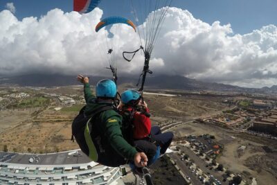 High Performance Paragliding Tandem Flight in Tenerife South - Who pilots: instructor hands or you at the controls