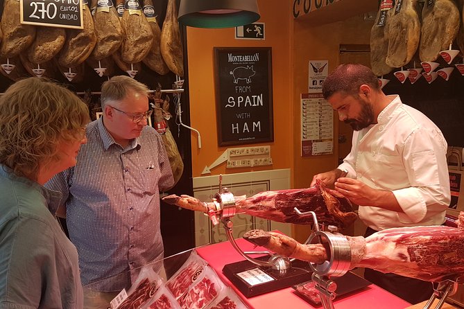 Iberian Ham and Wine Small Group Tour in Madrid - Entering Madrid’s Historical Quarter (Plaza de Isabel II start)